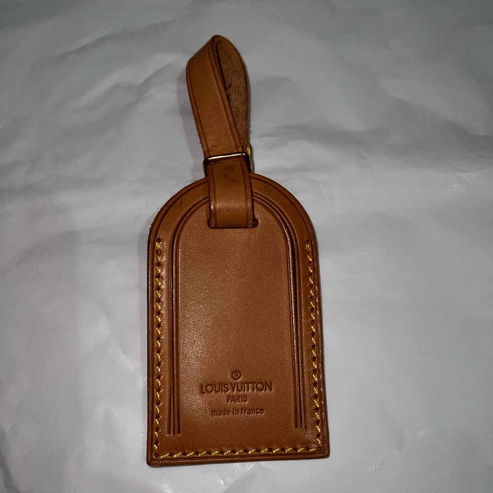 EUC Louis Vuitton luggage tag